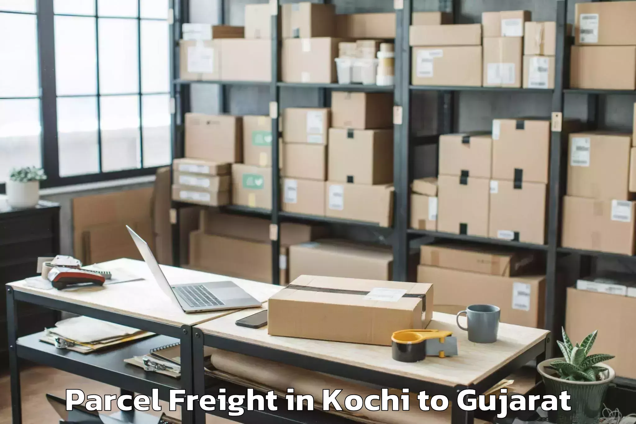 Easy Kochi to Sanand Parcel Freight Booking